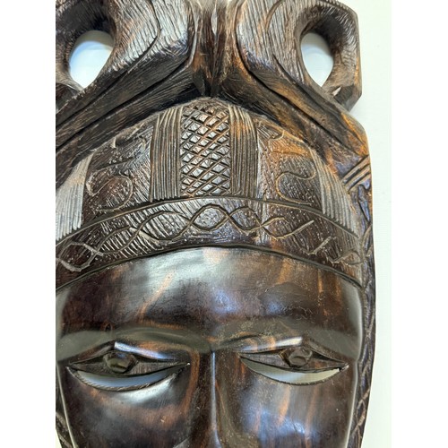 38 - Hand carved African tribal art wall mask 38 cm high.

This lot is available for in-house shipping