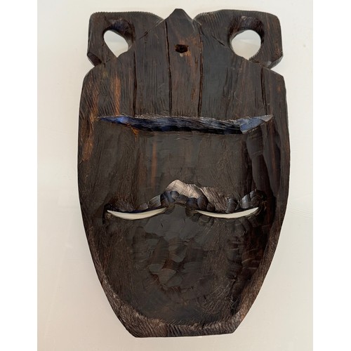 38 - Hand carved African tribal art wall mask 38 cm high.

This lot is available for in-house shipping