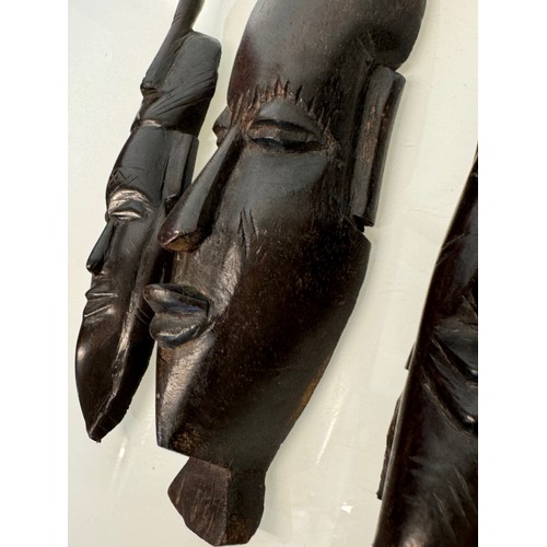 39 - Three hand craved African tribal art wall masks.

This lot is available for in-house shipping