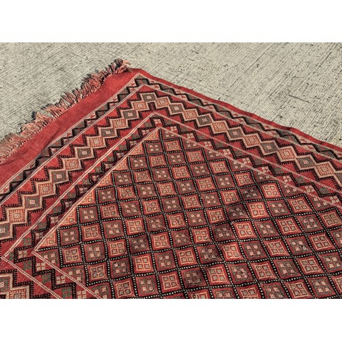 40 - Furnishings, a Hand Woven floor rug, 120 cm x 190 cm.

This lot is available for in-house shipping