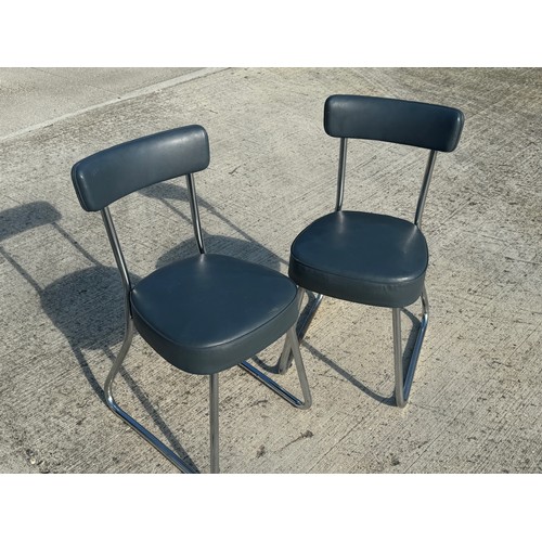 69 - Mid Century industrial furniture, a pair of upholstered chair with chrome plated frames.

This lot i... 