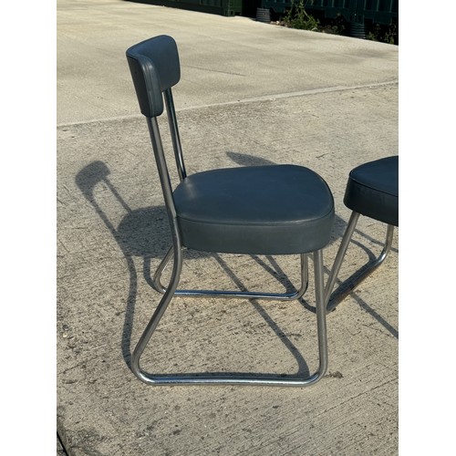 69 - Mid Century industrial furniture, a pair of upholstered chair with chrome plated frames.

This lot i... 