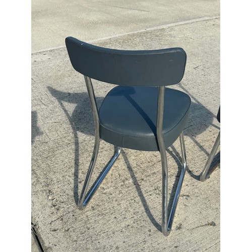 69 - Mid Century industrial furniture, a pair of upholstered chair with chrome plated frames.

This lot i... 