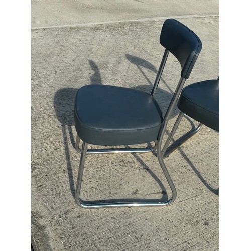 69 - Mid Century industrial furniture, a pair of upholstered chair with chrome plated frames.

This lot i... 