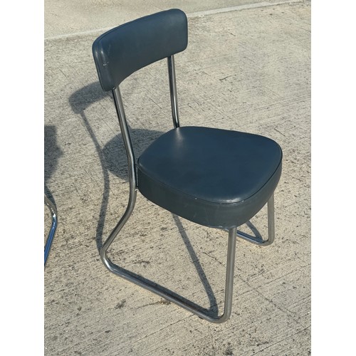 69 - Mid Century industrial furniture, a pair of upholstered chair with chrome plated frames.

This lot i... 