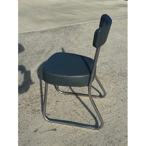 69 - Mid Century industrial furniture, a pair of upholstered chair with chrome plated frames.

This lot i... 