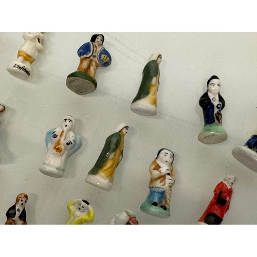 74 - A Collection of French Galette des Rois decorated porcelain figurines.

This lot is available for in... 