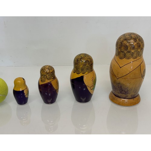 80 - Russian dolls, a graduated set of four dolls.

This lot is available for in-house shipping