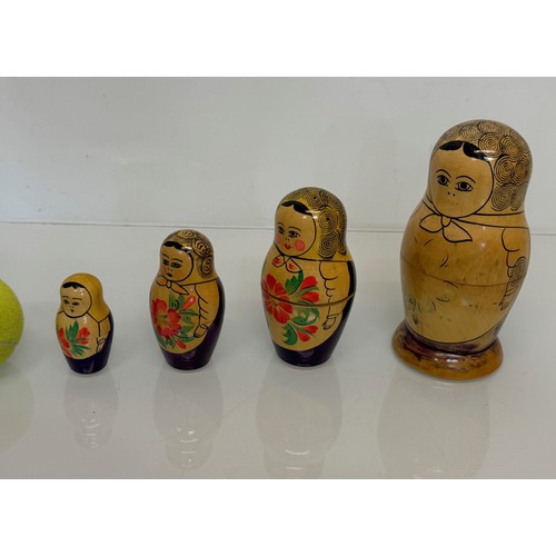 80 - Russian dolls, a graduated set of four dolls.

This lot is available for in-house shipping