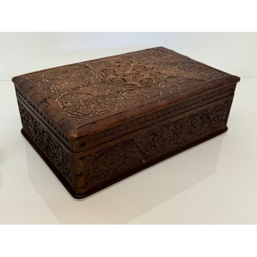 82 - Carved wooden box, with hand craved floral and leaf designs to the top and four sides. 28 cm x 18 cm... 