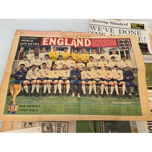 94 - Football ephemera ,a programme some league reviews and special edition newspapers, Arsenal, Spurs Ch... 