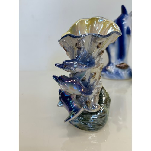 238 - Kitsch lustre ware ceramic vases etc all with a dolphin theme.

This lot is available for in-house s... 