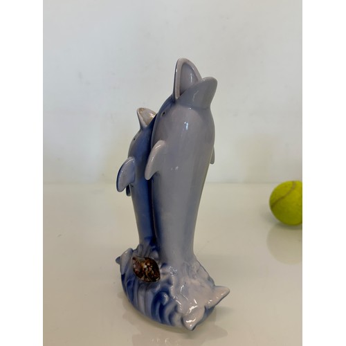 238 - Kitsch lustre ware ceramic vases etc all with a dolphin theme.

This lot is available for in-house s... 