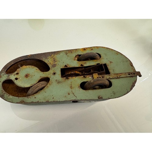 239 - Tin plate toy bumper car, with clockwork drive mechanism. 25 cm long, x 11 cm x 7 cm tall. a/f

This... 