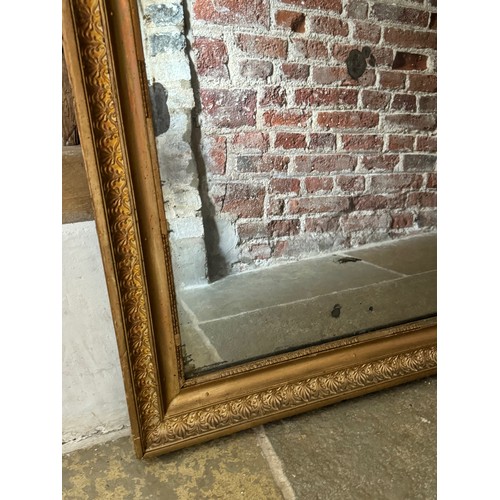 246 - Gilt framed wall mirror of large proportions, some nice aging marks to the silvering as shown, this ... 