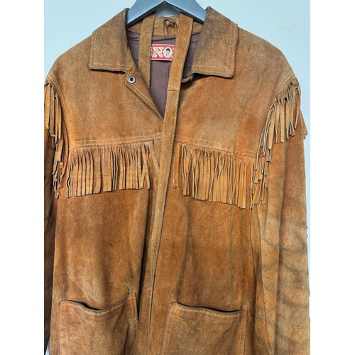 387 - Vintage fashion, English made SNOB brand fringed suede leather jacket.

This lot is available for in... 