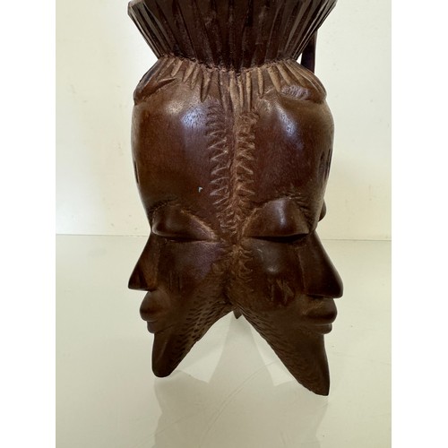 388 - Tribal art candle stand, hand carved north African hard wood stand, 25 cm tall.

This lot is availab... 