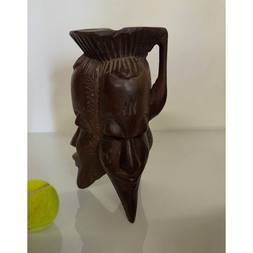 388 - Tribal art candle stand, hand carved north African hard wood stand, 25 cm tall.

This lot is availab... 