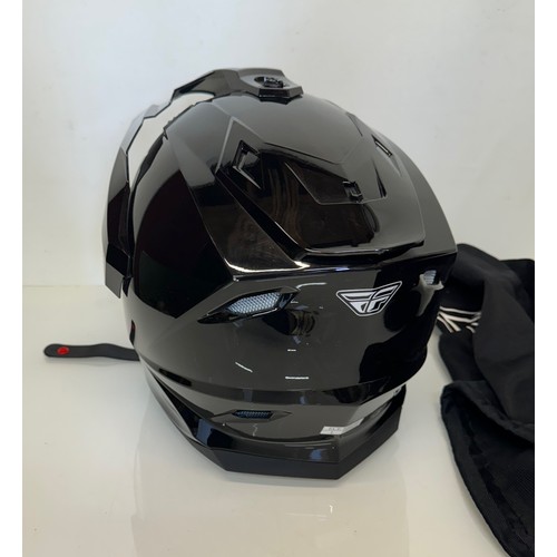 390 - Motorcycle helmet unused condition in it’s bag size L.

This lot is available for in-house shipping