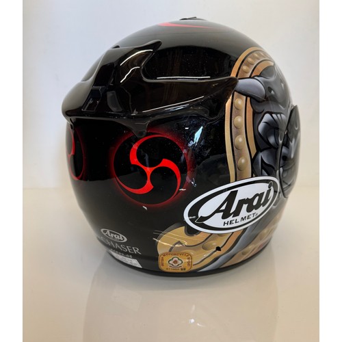 391 - Automobilia, an Arai Chaser motorcycle helmet decorated with devil graphics on a metal flack base co... 