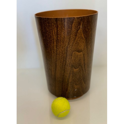 395 - Mid century furniture, a wood effect plastic bin. 22cm diameter x 33 cm tall.

This lot is available... 