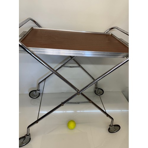 396 - Folding tea trolley, classic mid century furniture.

This lot is available for in-house shipping