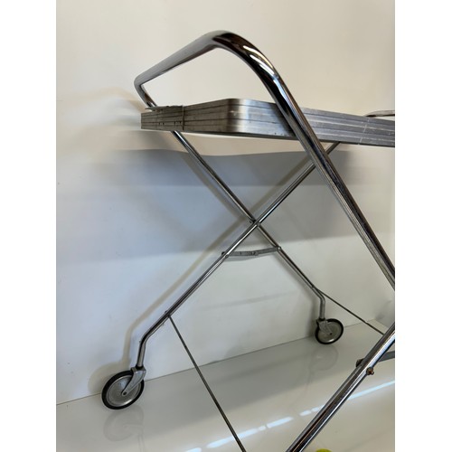 396 - Folding tea trolley, classic mid century furniture.

This lot is available for in-house shipping