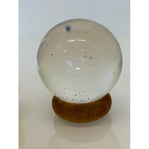 402 - Mystic Glass ball on stand.

This lot is available for in-house shipping