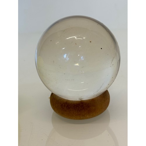 402 - Mystic Glass ball on stand.

This lot is available for in-house shipping