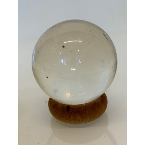 402 - Mystic Glass ball on stand.

This lot is available for in-house shipping