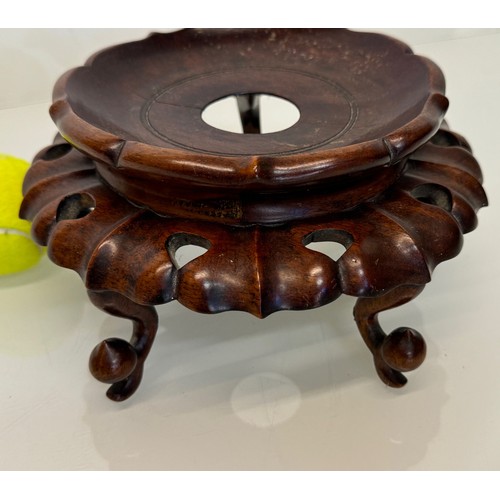 404 - Oriental carved wooden stand 23 cm diameter and 12 cm high a/f and an inlaid box  20 cm x 13 cm x 9 ... 