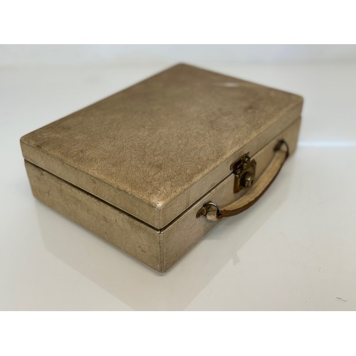 406 - Jewellery case with separated inner storage and tray to the top, 25 cm x 18 cm x 8 cm.

This lot is ... 