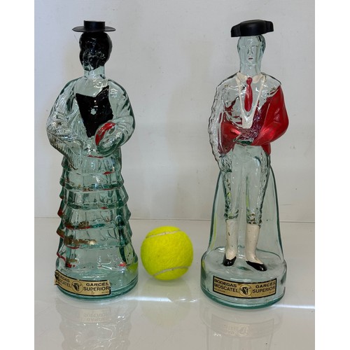 407 - Kitsch mid century glass ware, a pair of Bodegas Superior traditional Spanish figure bottles. Each 3... 