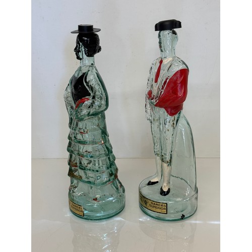 407 - Kitsch mid century glass ware, a pair of Bodegas Superior traditional Spanish figure bottles. Each 3... 