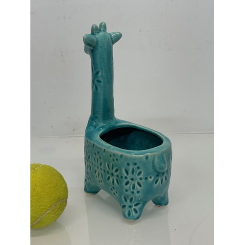 175 - Mid century studio pottery giraffe vase. 20 cm tall.

This lot is available for in-house shipping