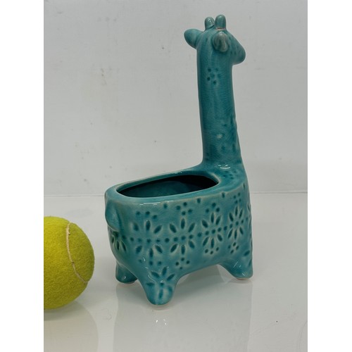 175 - Mid century studio pottery giraffe vase. 20 cm tall.

This lot is available for in-house shipping