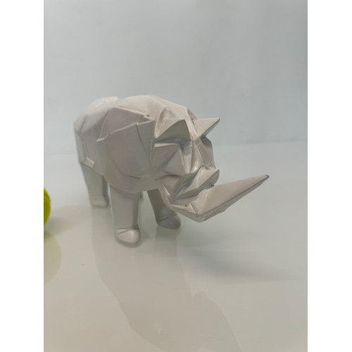 5 - Mid Century designer art, a decorative geometric figure of a Rhino late C20th a/f, 31 cm. long., 13 ... 