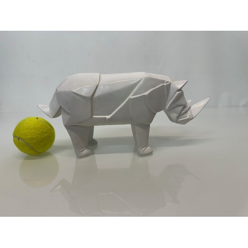 5 - Mid Century designer art, a decorative geometric figure of a Rhino late C20th a/f, 31 cm. long., 13 ... 