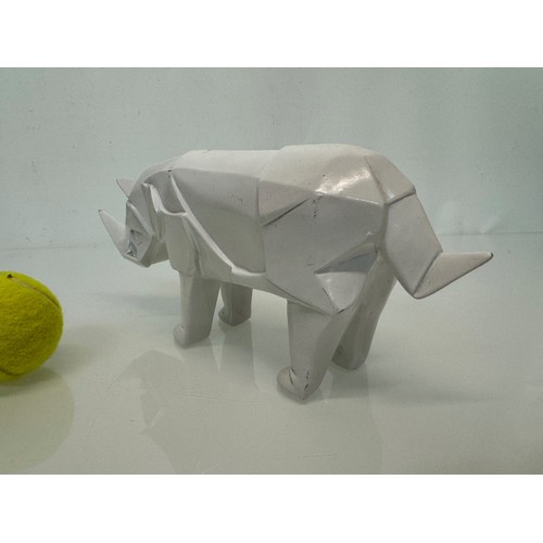 5 - Mid Century designer art, a decorative geometric figure of a Rhino late C20th a/f, 31 cm. long., 13 ... 