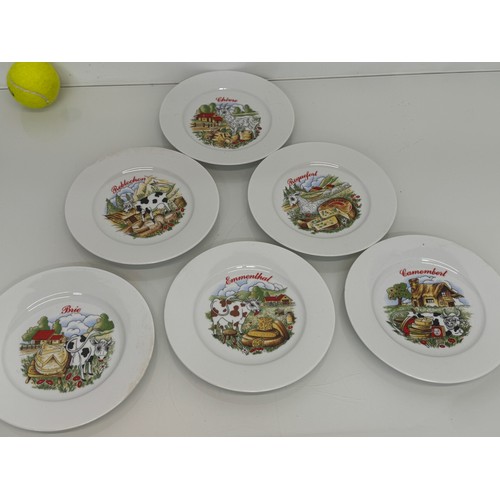 23 - AA set of kitsch mid century table wares, decorated plates with a theme for French regional cheeses.... 