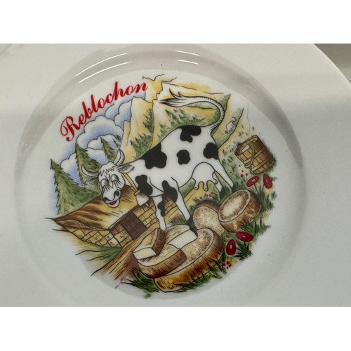 23 - AA set of kitsch mid century table wares, decorated plates with a theme for French regional cheeses.... 