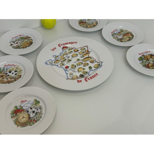 23 - AA set of kitsch mid century table wares, decorated plates with a theme for French regional cheeses.... 