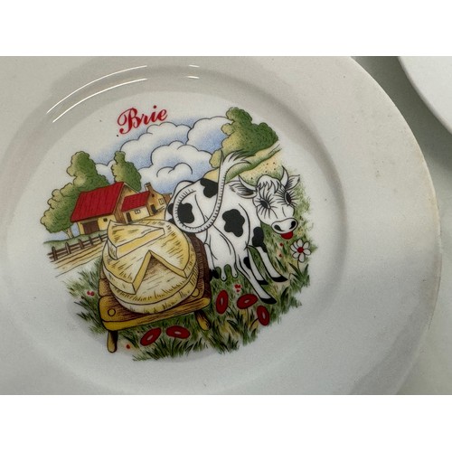 23 - AA set of kitsch mid century table wares, decorated plates with a theme for French regional cheeses.... 