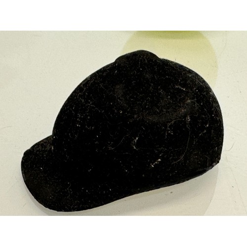 26 - A miniature Gelot of Paris branded riding hat 7 cm long in a hat box.

This lot is available for in-... 