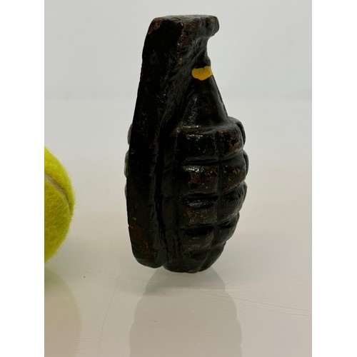 28 - Militaria, a cast iron practice grenade. 11 cm tall.

This lot is available for in-house shipping