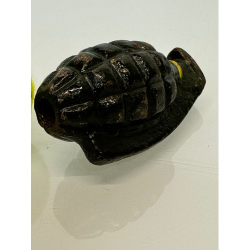 28 - Militaria, a cast iron practice grenade. 11 cm tall.

This lot is available for in-house shipping