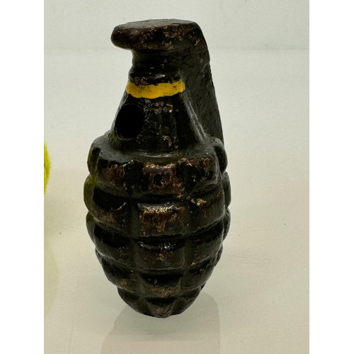 28 - Militaria, a cast iron practice grenade. 11 cm tall.

This lot is available for in-house shipping