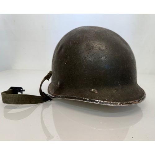 38 - Militaria, US Vietnam era steel helmet.

This lot is available for in-house shipping