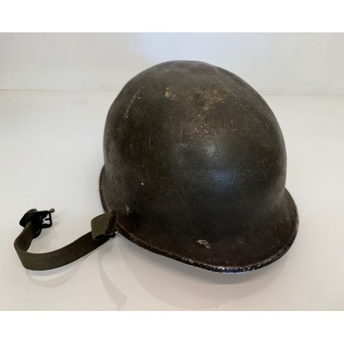 38 - Militaria, US Vietnam era steel helmet.

This lot is available for in-house shipping