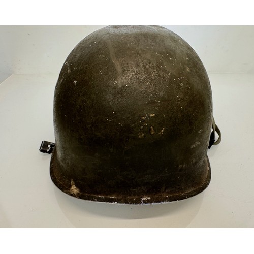 38 - Militaria, US Vietnam era steel helmet.

This lot is available for in-house shipping